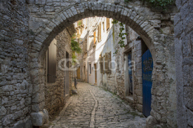 Fototapety Old and narrow street, paved of cobble stones, Bale, Croatia