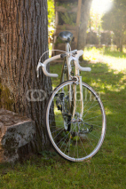 Naklejki old bike in the foreground outdoors, vintage