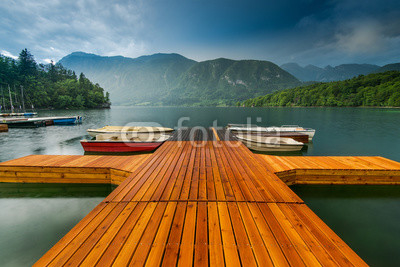 Colorful and artistic wooden pier at Bohinj Lake, Slovenia