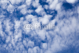 Naklejki Abstract sky background with contrast cumulus clouds