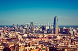 Fototapety Barcelona`s skyline with skyscrapers.