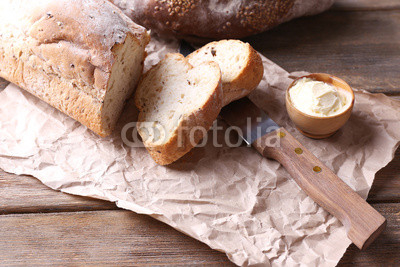 Fresh bread on wooden background