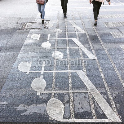 A crosswalk painted as music notes in one of Tirana streets. 
