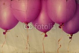 pink balloons. Photo in old image style.