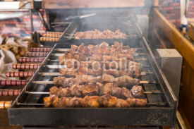 Fototapety Close Up of Kebabs Roasting on Hot Grill