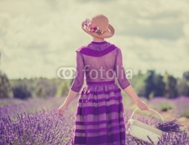 Naklejki Retro style woman in a lavender field