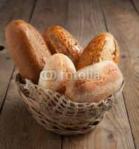 Fototapety Bakery product assortment with bread loaves and buns