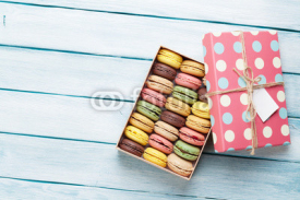 Colorful macaroons in a gift box