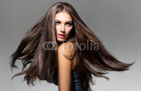 Naklejki Fashion Model Girl Portrait with Long Blowing Hair