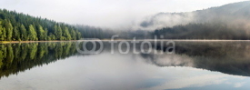 Fototapety Foggy Landscape. Misty landscape of Lake Saint Anne. 