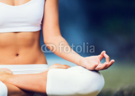Fototapety Beautiful Woman Practicing Yoga Outside In Nature