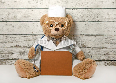 Teddy bear-doctor with a book
