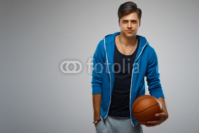 Portrait of a young man basketball player