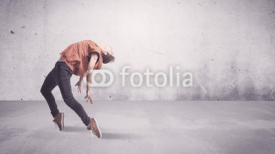 Naklejki Pretty urban dancer with empty background