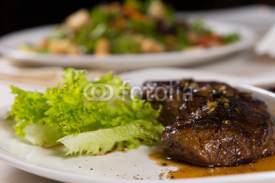 Fototapety Close Up of Steak on Plate with Garnish
