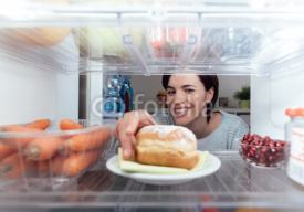 Woman having an unhealthy snack