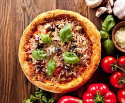 Naklejki Fresh italian pizza on wood