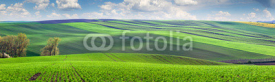 Fototapety Wonderful panoramic view of fields in beautiful colorful valley