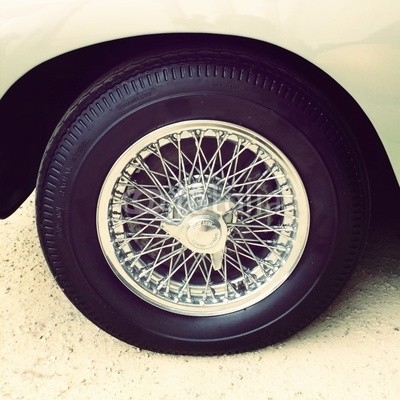 close-up of vintage car wheel, retro style