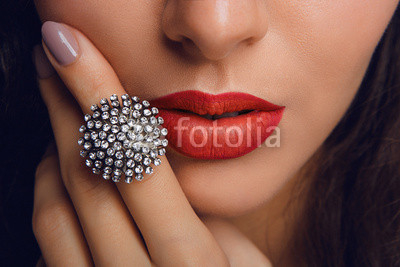 Red lips with the ring. Make up