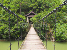 Naklejki suspension bridge over asian river