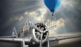 Old aircraft and hot air baloon. Retro style picture on aviation theme.