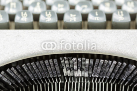 Fototapety Close up of the letters on an old typewriter.
