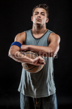 Fototapety young man on dark background