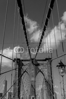 Brooklyn Bridge with American flag in black and white