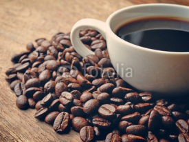 Fototapety Coffee on grunge wooden background