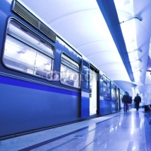 Naklejki Blue fast train stay at hall platform