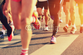 Naklejki marathon runner legs running on city street