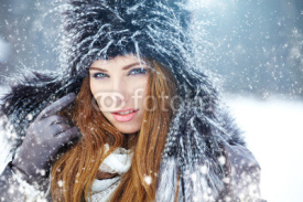 Naklejki Young woman winter portrait. Shallow dof.