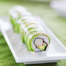 Fototapety Sushi - Dragon roll with avocado and crab meat
