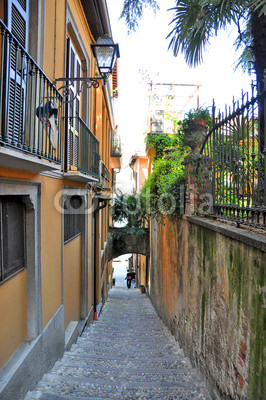Narrow street of Bellagio town at the famous Italian lake Como