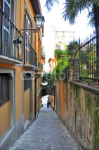 Fototapety Narrow street of Bellagio town at the famous Italian lake Como