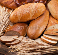 Fototapety Bread and wheat. Food background.
