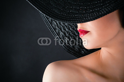 fashionable glamorous woman in hat closeup