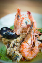 Naklejki risotto with mussels, prawns and seafood