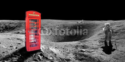 Red english london phone booth on the surface of the moon - elements of this image are provided by NASA