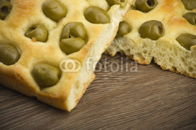 Fototapety focaccia with olives ,focaccia is flat oven baked Italian bread