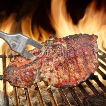 Naklejki Roasted Pork Ribs on the Flaming Grill
