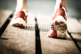 Naklejki Feet of jogging person