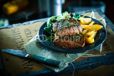 Succulent grilled beef steak and vegetables