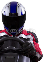 Obrazy i plakaty racerwearing red racing suit and blue helmet on a steering wheel