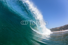 Naklejki Ocean Wave Swimming Inside Blue