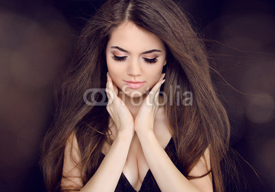 Beautiful woman with long brown hair. Fashion long hairstyles