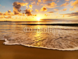 Naklejki beautiful sunset on the  beach