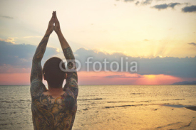 Man practicing yoga in various poses (asana)