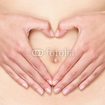 Pregnant woman pregnancy concept heart on stomach